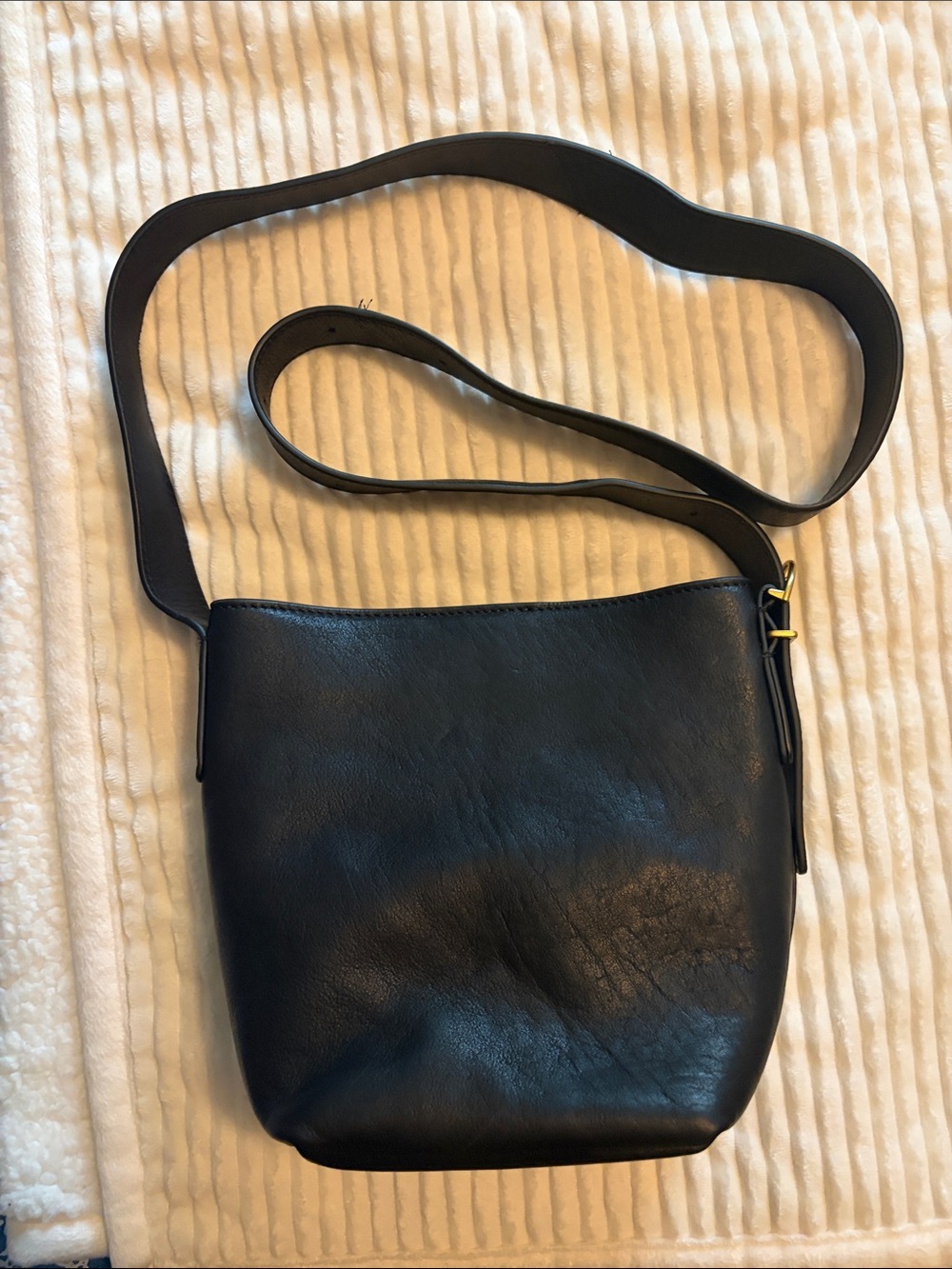 Genuine leather crossbody/bucket handbag in Black